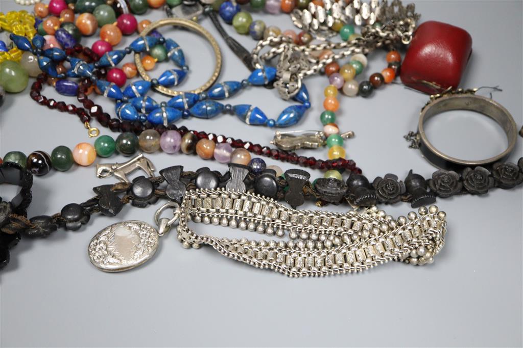 Mixed jewellery including costume, white metal fringe necklace with locket, amethyst bead necklace etc.